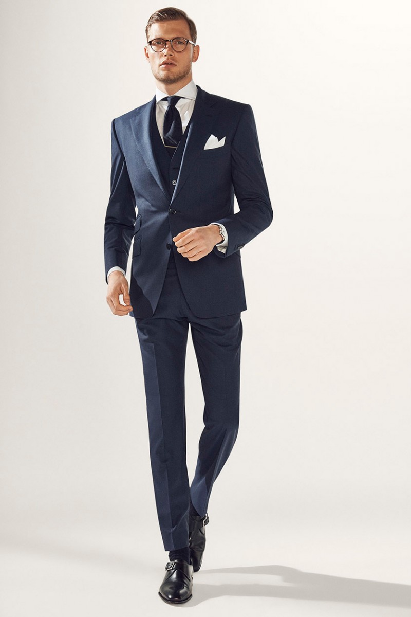 Stefan Pollmann dons glasses and suits up for Massimo Dutti's colonial collection.