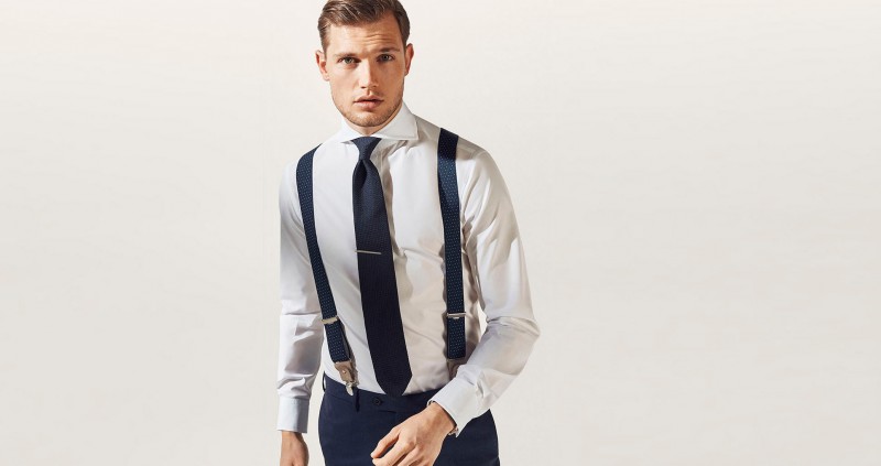 Stefan Pollmann is banker chic in a crisp white dress shirt and suspenders for Massimo Dutti.