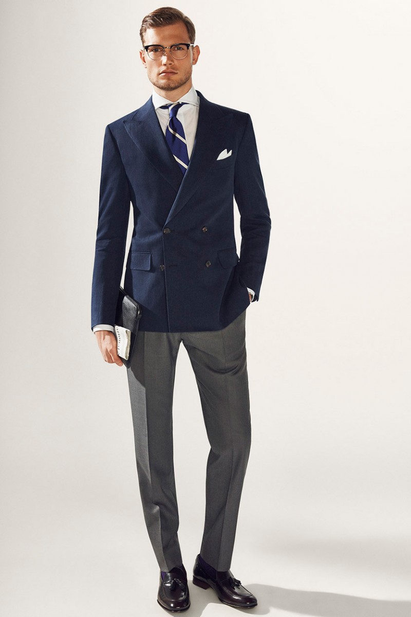 Stefan Pollmann cuts a sharp figure in Massimo Dutti's double-breasted blazer with grey trousers.