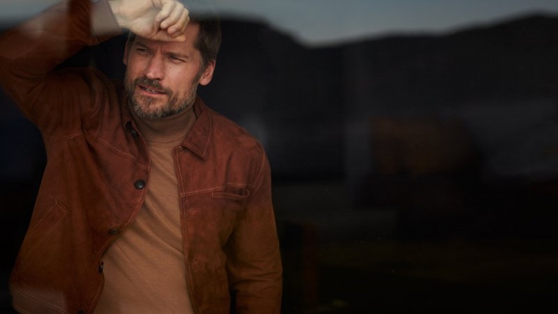 Nikolaj Coster-Waldau wears suede jacket Oliver Spencer and turtleneck sweater Ami.