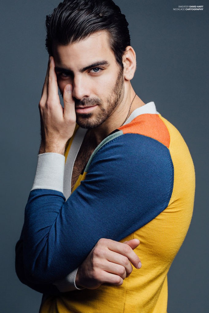 Nyle DiMarco has a colorful moment in a cardigan from David Hart.