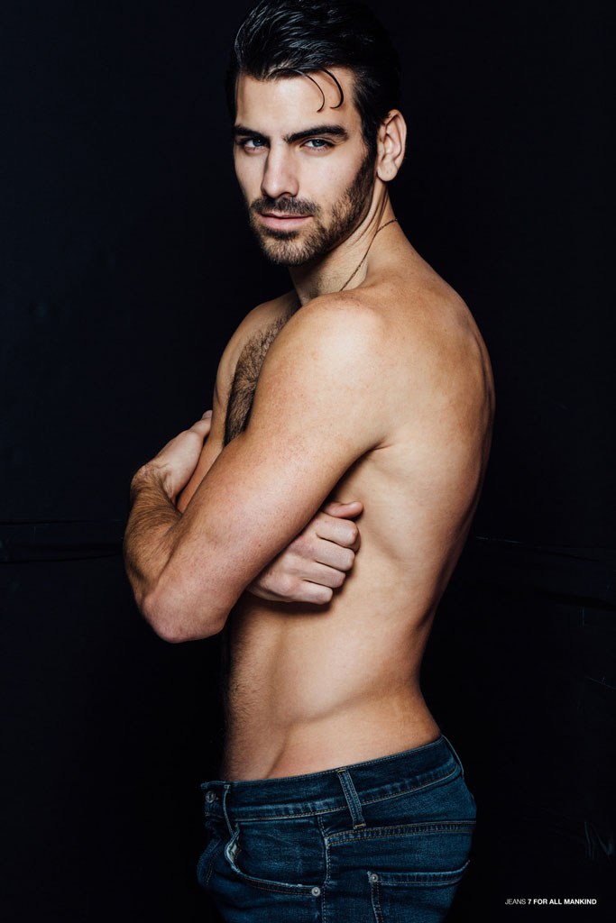 Nyle DiMarco photographed in 7 For All Mankind denim.