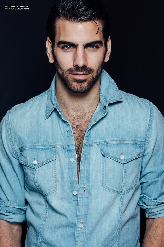 Nyle DiMarco rocks a denim shirt from 7 For All Mankind.