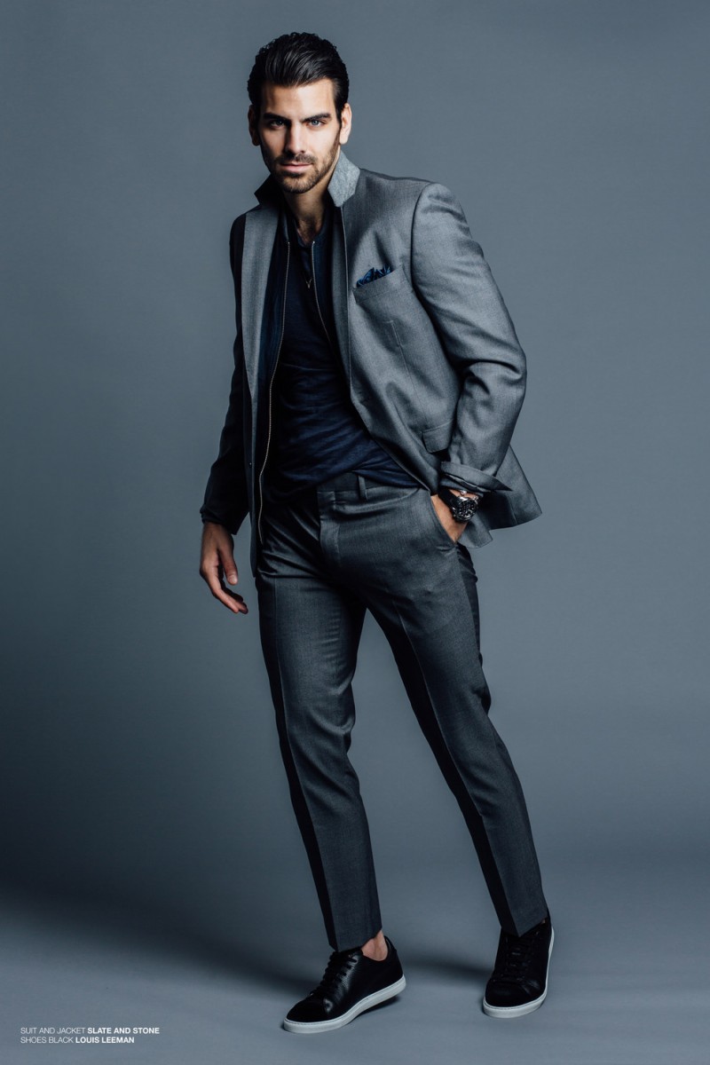 Nyle DiMarco goes for a tailored look in a suit and jacket from Slate and Stone.