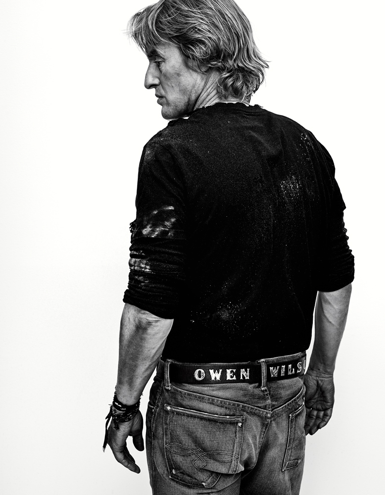 Owen Wilson sports a belt with his name for a photo by Gregory Harris.