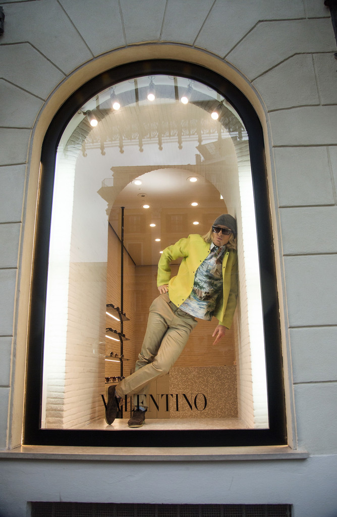 Owen Wilson poses as Hansel in the store window of Valentinos Rome store.