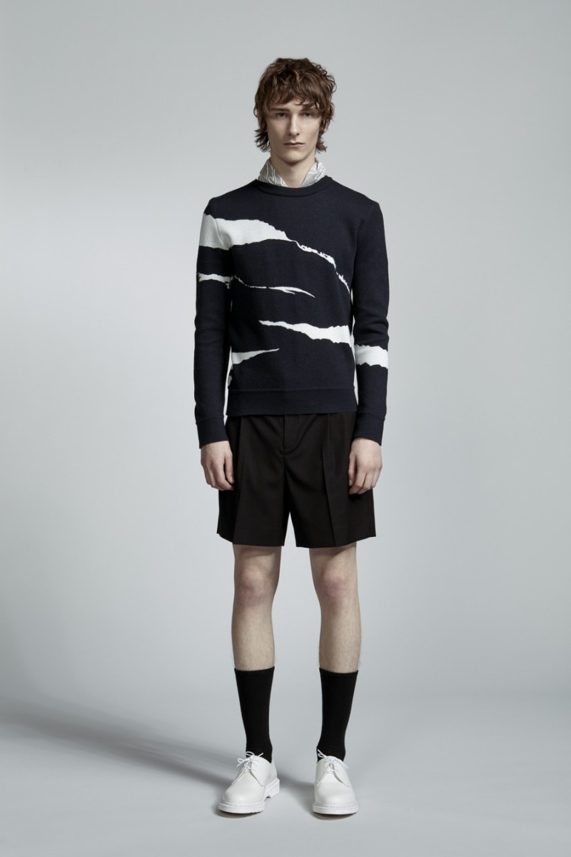 Dominik Hahn rocks a graphic black spring look from PLAC.