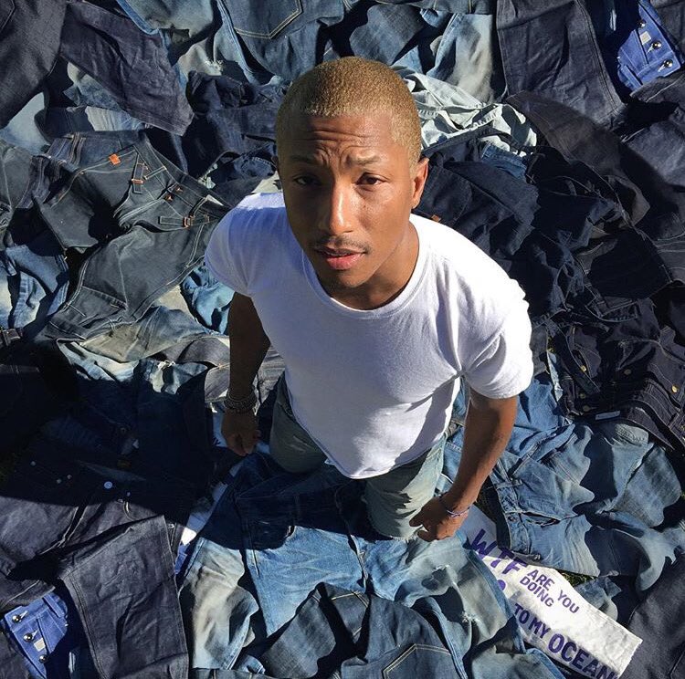 Pharrell Williams poses with a massive array of denim for G-Star.