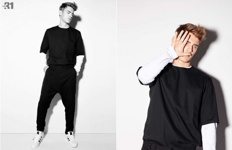 Bo Develius has a 90s style moment as he layers a long-sleeve shirt with a t-shirt.