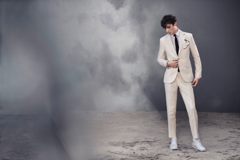 Adrien Sahores is a dandy vision in a light colored suit for Tiger of Sweden's spring-summer 2016 campaign.