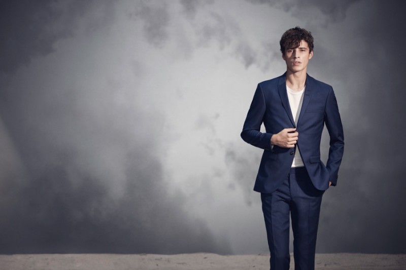 Adrien Sahores dons navy suiting for Tiger of Sweden's spring-summer 2016 campaign.