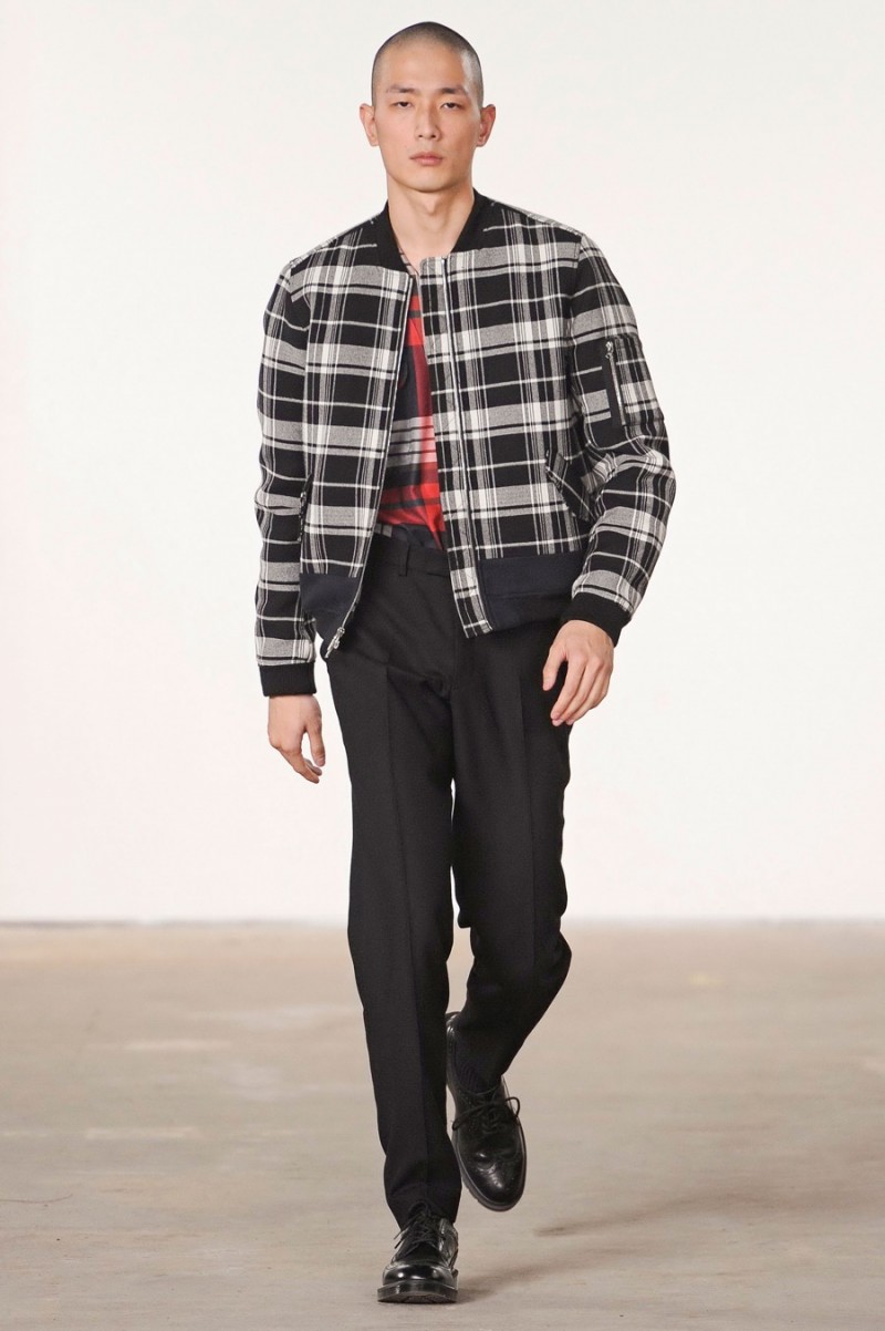 Timo Weiland showcases plaid fashions as part of its fall-winter 2016 men's collection.