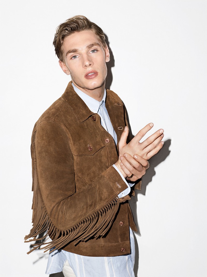 Tommy Marr rocks a suede fringe jacket from J.Lindeberg.