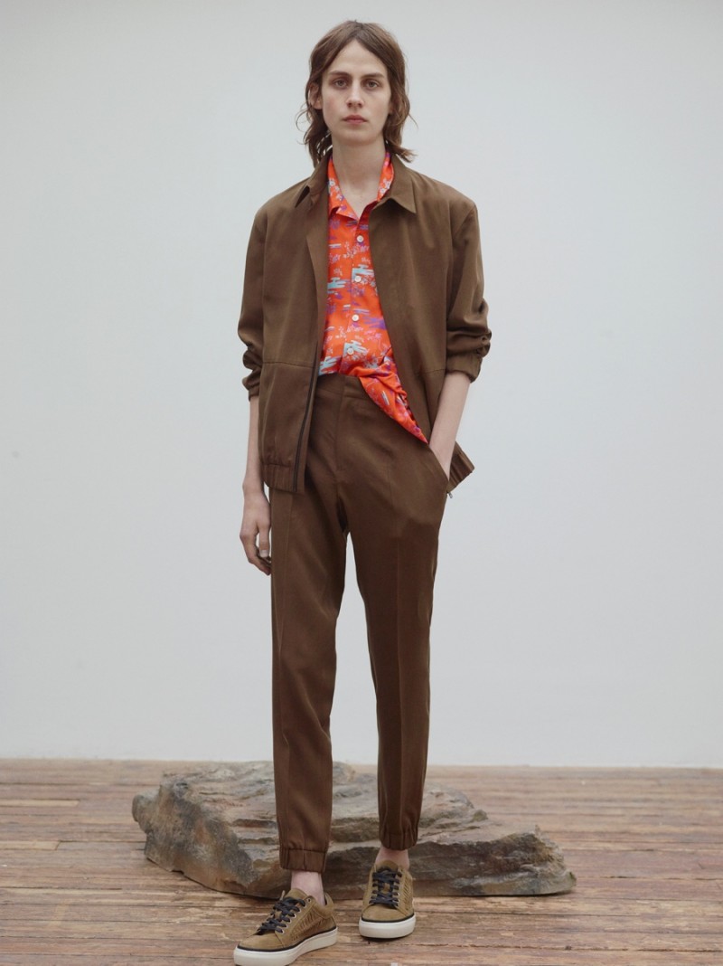 A tropical patterned shirt breaks up a leisure suit, consisting of trousers with elasticated legs and a sporty zipped jacket.