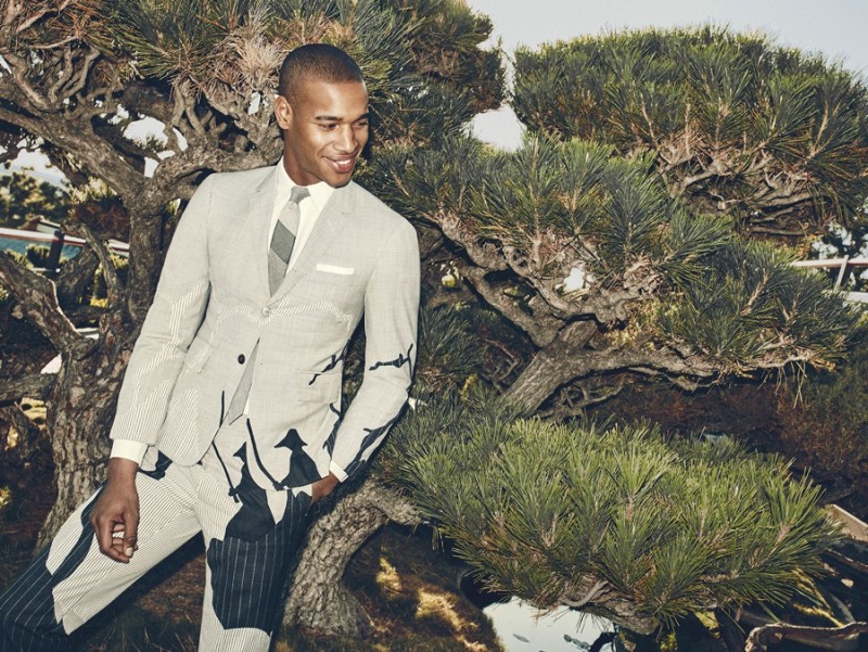 Sacha M'Baye wears all clothes Thom Browne.