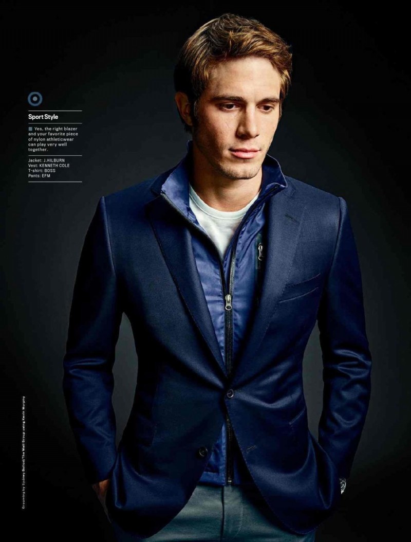 Blake Jenner does sporty luxe, pairing a navy blazer with a nylon jacket.