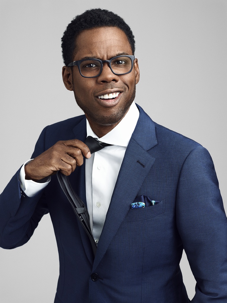 Chris Rock poses for a cheeky image for Essence magazine.
