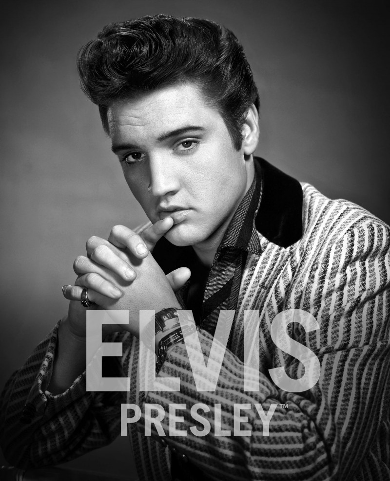 Elvis Presley rocks one of his signature pompadours. 