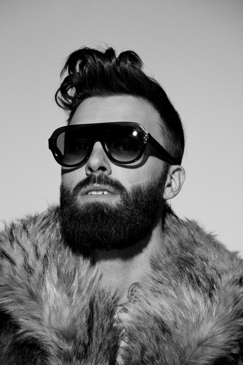 Levi Stocke plays it cool, embracing a poofy hairstyle.