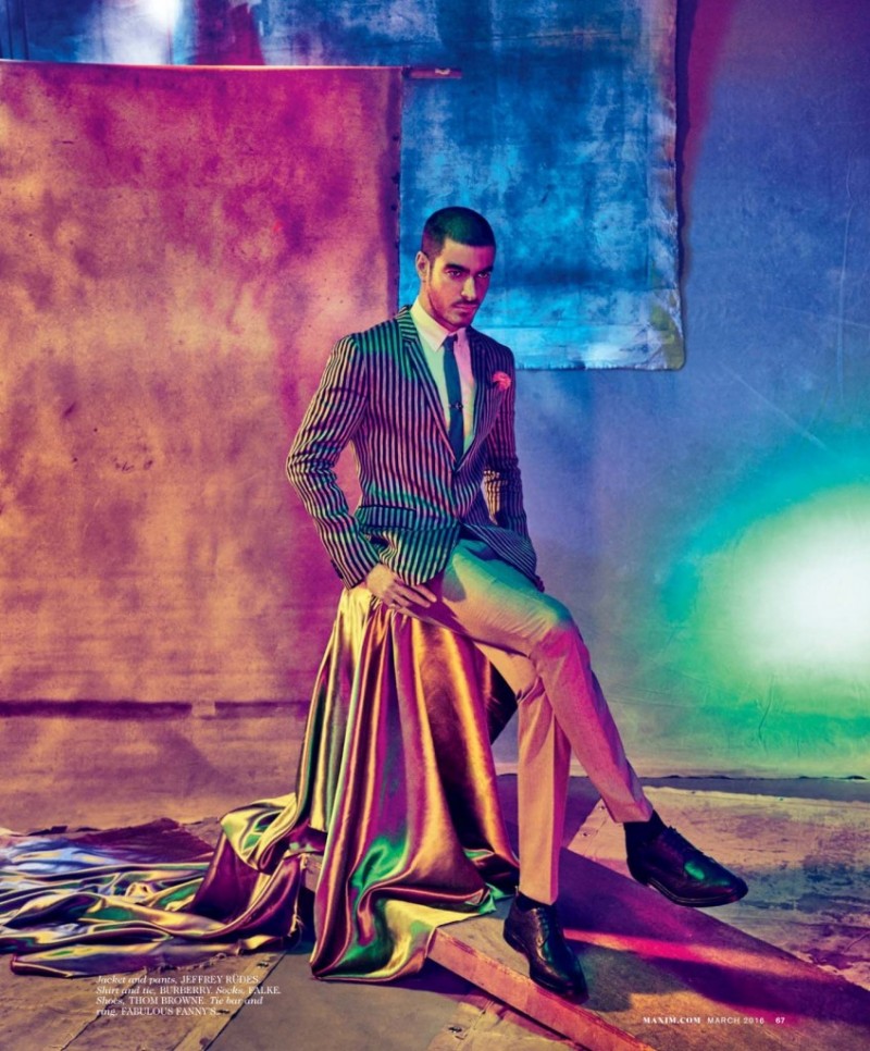 Gui Fedrizzi dons a striped jacket and pleated trousers from Jeffrey Rüdes.