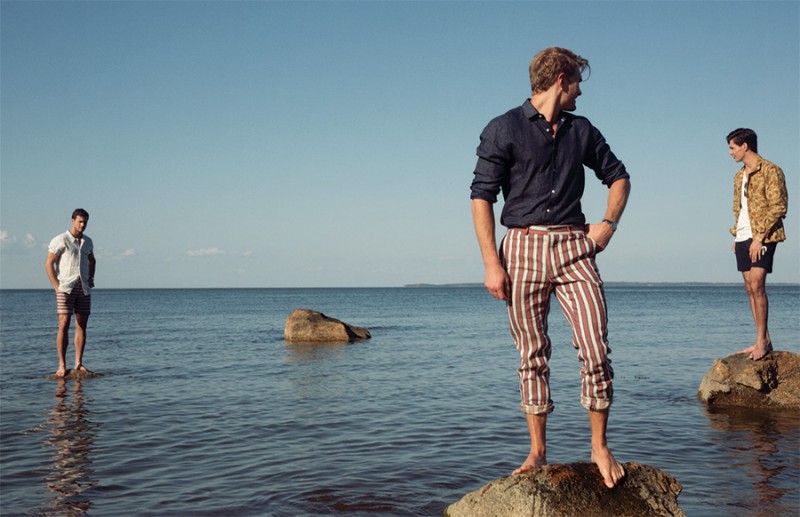 Haspel embraces a casual stride with striped trousers.