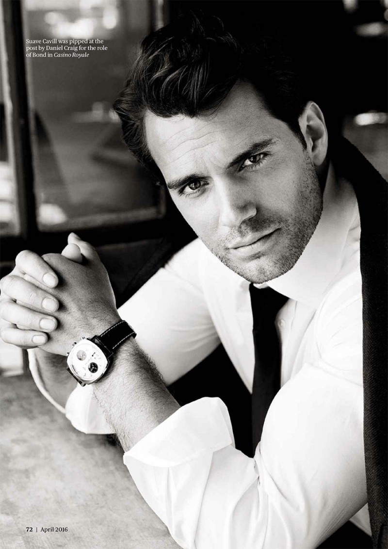 Henry Cavill showcases a dapper edge in a fitted white dress shirt and black tie for the pages of Men's Fitness UK.