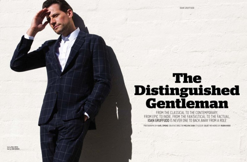 Ioan Gruffudd dons a navy windowpane print suit from Paul Smith for the pages of August Man.