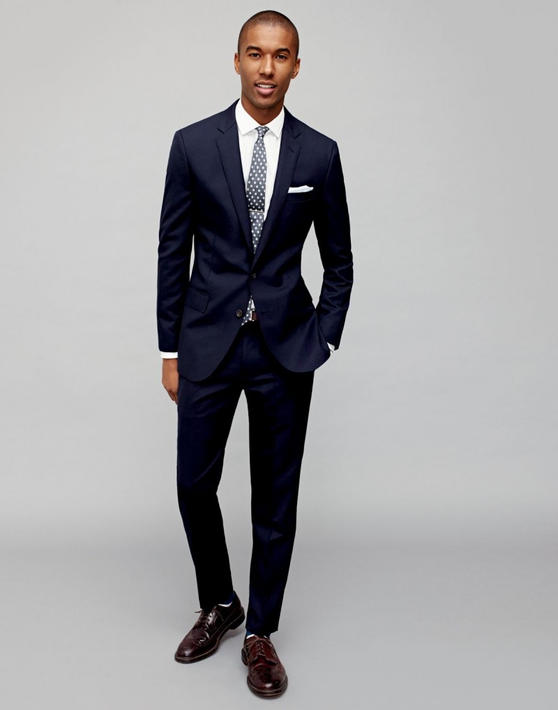 Classic Style: J.Crew's navy suit is front and center with an essential white dress shirt and blue patterned tie. » J.Crew Styles the Suit 5 Ways Classic Style: J.Crew's navy suit is front and center with an essential white dress shirt and blue patterned tie.