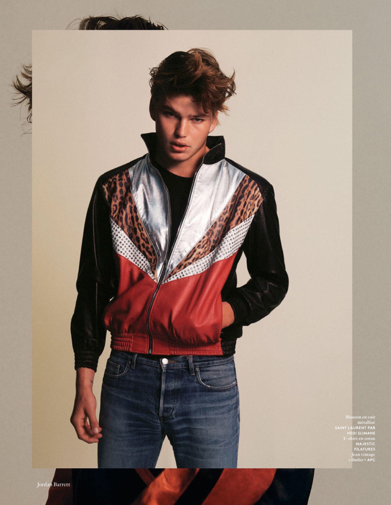 Jordan Barrett sports a retro style track jacket from Saint Laurent.