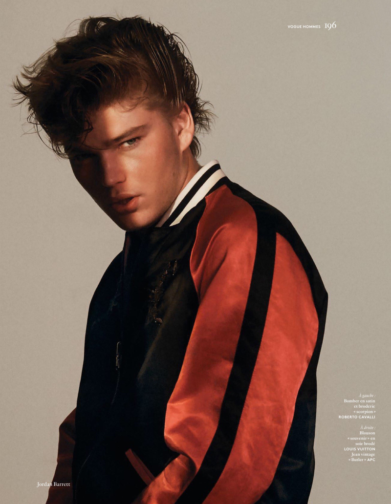 Jordan Barrett pictured in a Roberto Cavalli satin bomber jacket.