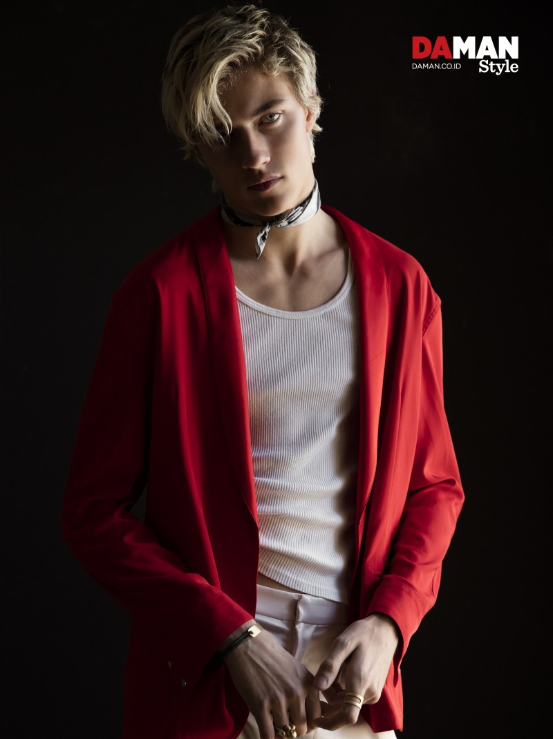 Lucky Blue Smith rocks a Palace Costume tank with a jacket and trousers from Baja East.