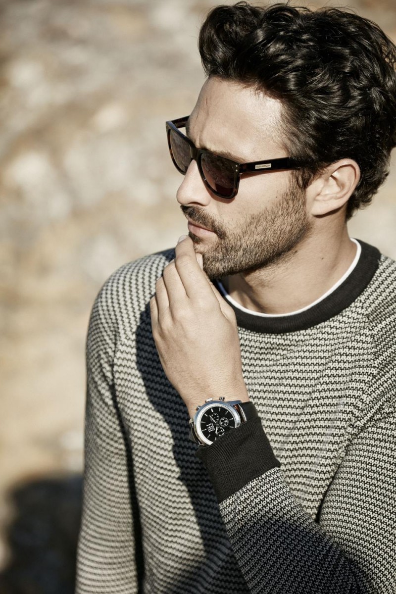 Noah Mills plays it cool in a stripe pullover and modern sunglasses for Pedro del Hierro's spring-summer 2016 campaign.