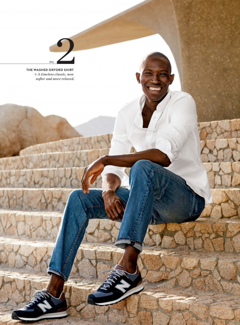 Armando Cabral is all smiles in a Nordstrom oxford shirt with Rag & Bone denim jeans and New Balance sneakers.