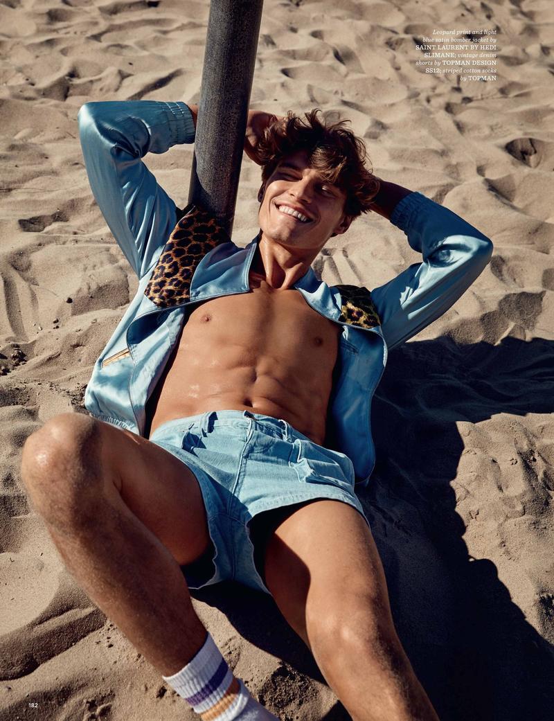 Oliver Cheshire sports a leopard print satin bomber from Saint Laurent with Topman vintage denim shorts.