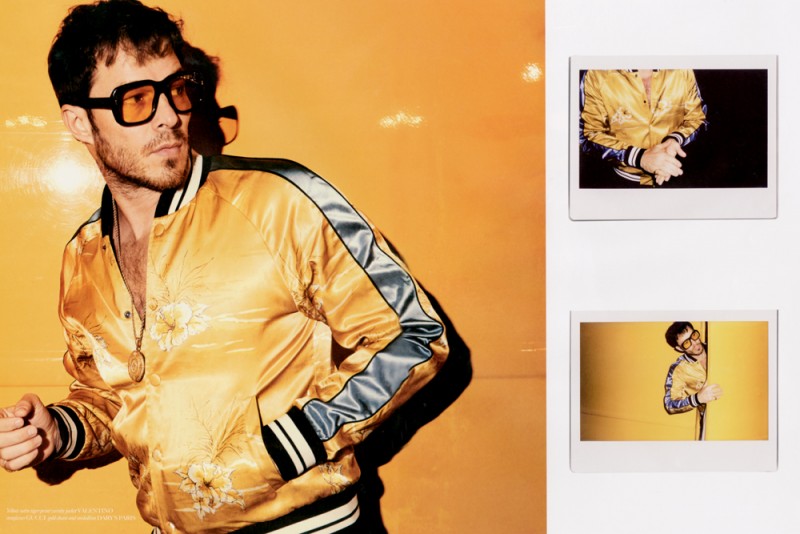 Paul Sculfor channels 1970s style in a golden yellow souvenir jacket from Valentino.