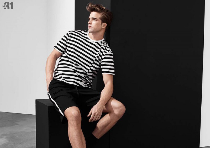 River Viiperi goes casual in a black & white striped t-shirt.