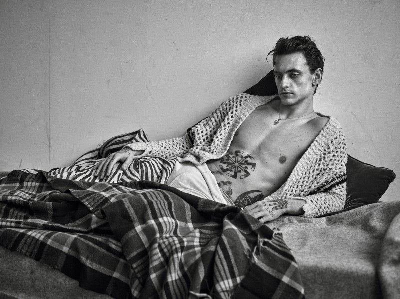 Sergei Polunin styled by Anastasia Barbieri in an open cardigan for Vogue Hommes Paris.