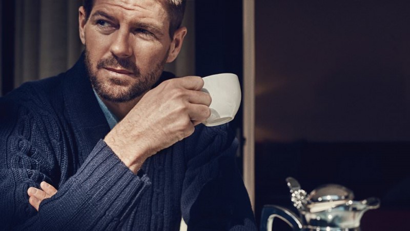 Steven Gerrard wears cable-knit cardigan Gucci and Japanese chambray-cotton shirt Officine Generale.