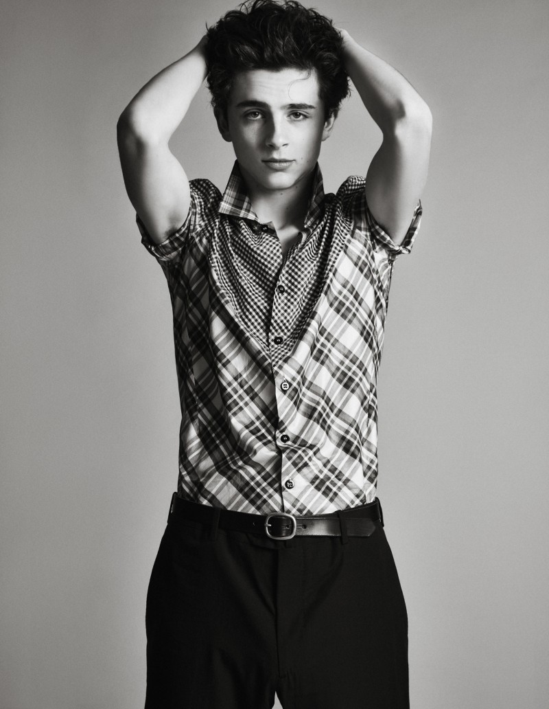 Timothée Chalamet wears shirt Raf Simons, trousers Margaret Howell and belt Maximum Henry.