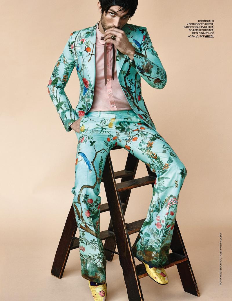 Tobias Sorensen is a style standout in a bold green nature themed print suit from Gucci.