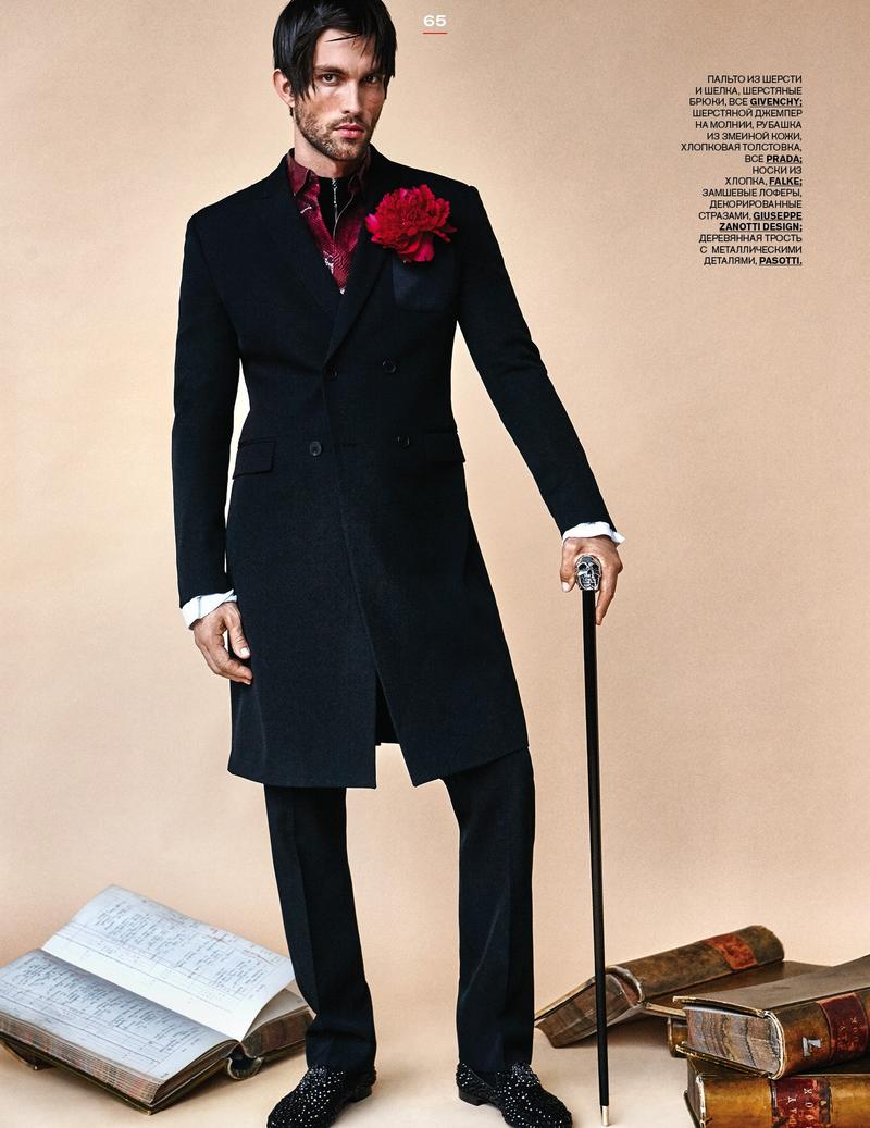 Tobias Sorensen dons a topcoat from Parisian fashion house Givenchy.