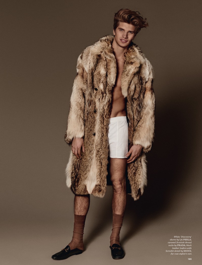 Styled by Luke Day, Toby Huntington-Whiteley dons an extravagant fur coat for British GQ Style.