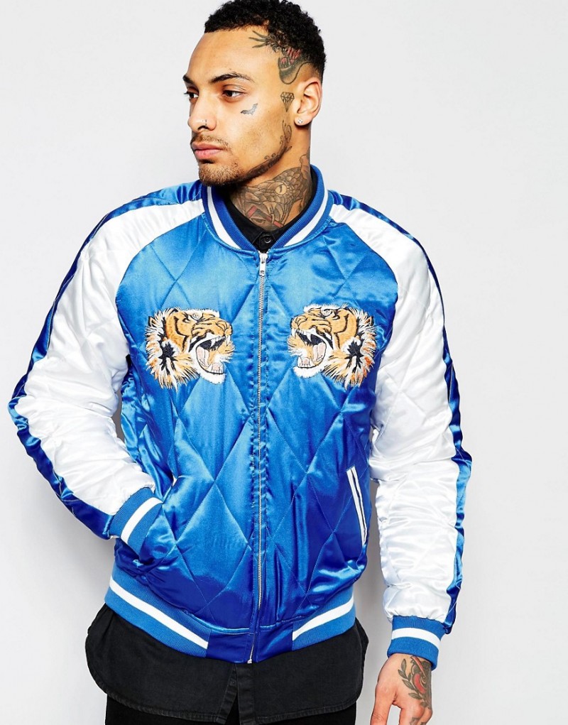 ASOS Quilted Souvenir Jacket with Tiger Embroidery: ASOS revisits the souvenir jacket with a quilted bomber jacket that features a tiger embroidery.