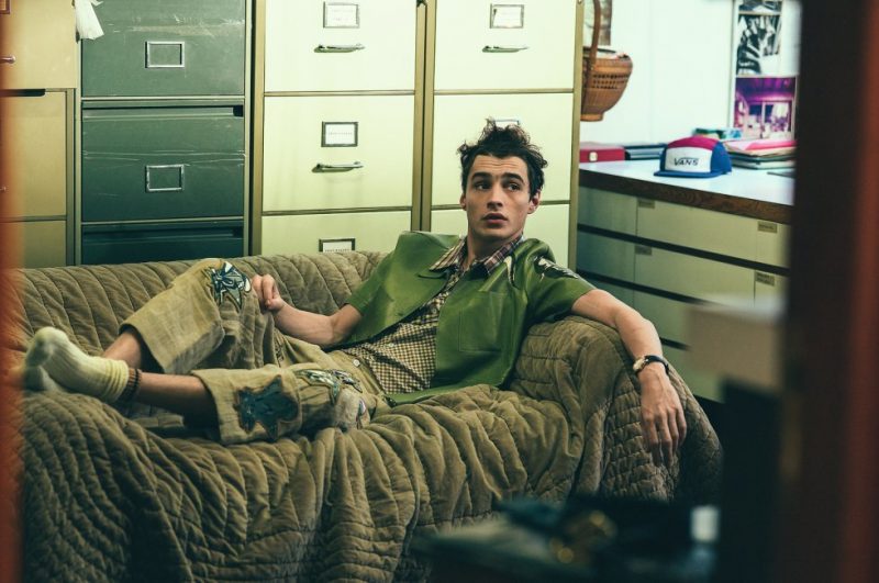 Adrien Sahores relaxes in a plaid Raf Simons shirt, leather Valentino jacket and Loewe trousers.