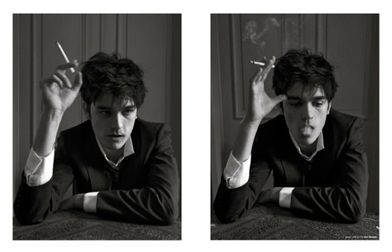 Donning a suit from Dior Homme, Alain-Fabien Delon enjoys a smoke.