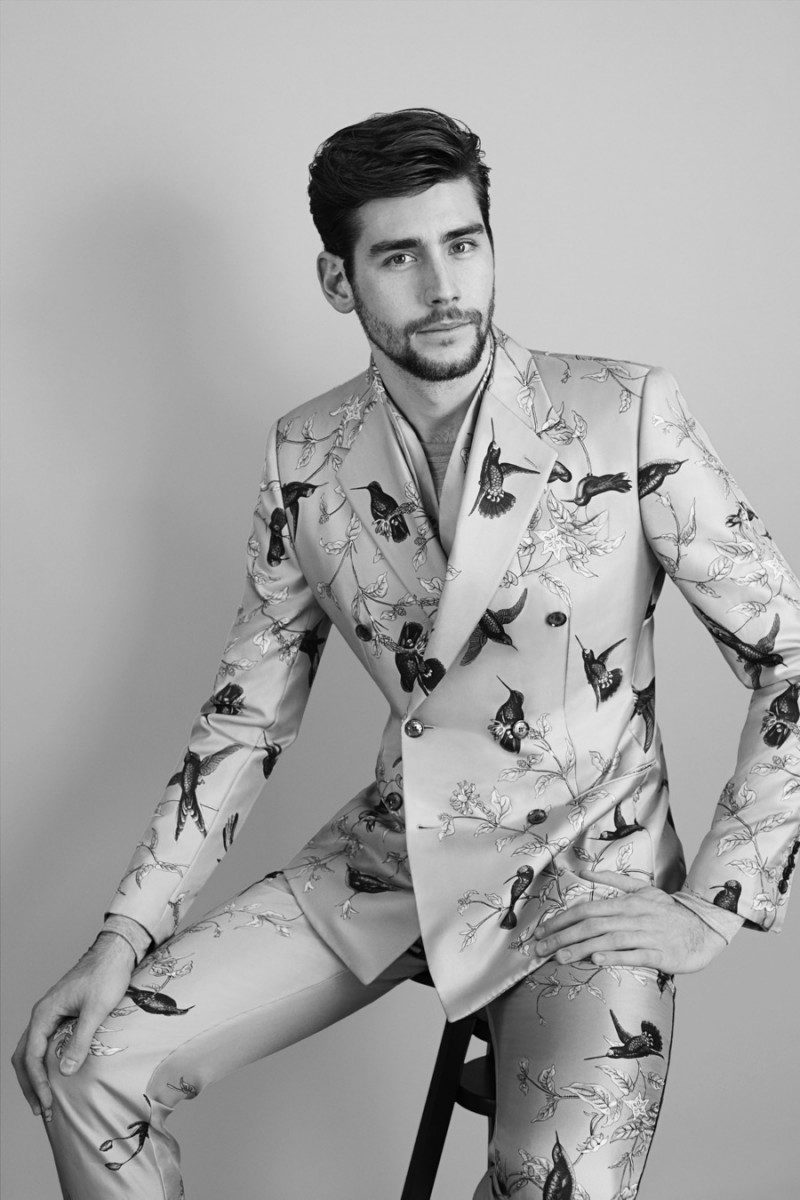 Alvaro Soler pictured in a silk printed suit from Dolce & Gabbana.