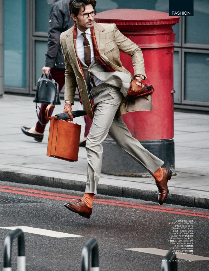 Andres Velencoso Segura is a man on the move in a coat, suit, shirt and tie from Dunhill.