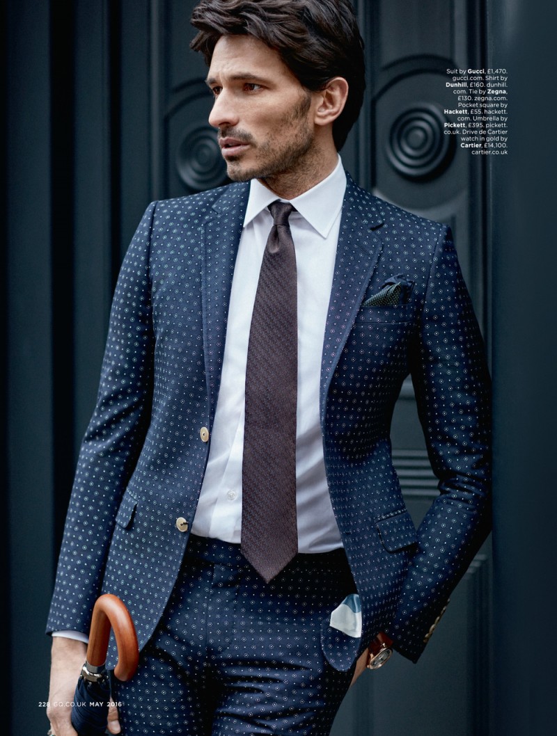 Andres Velencoso Segura is a sharp vision in a navy printed suit from Gucci.
