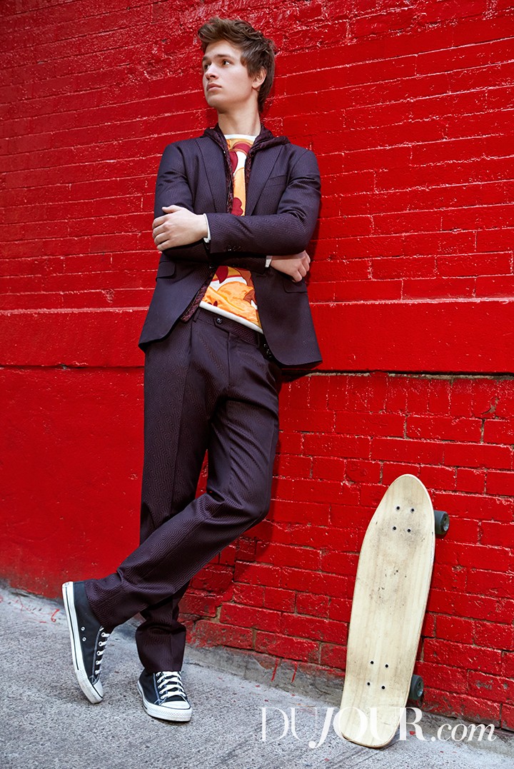 Ansel Elgort wears suit and jacket Pal Zileri, sweatshirt Scotch & Soda and sneakers Converse.