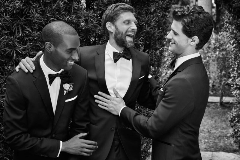 Corey Baptiste, RJ Rogesnki and Garrett Neff are in a celebratory mood as they connect with BOSS Hugo Boss for its grand tuxedo outing.